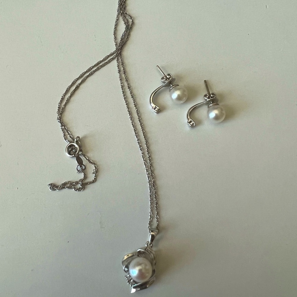 Genuine Pearl, 14K white gold, and diamond earring and necklace set.